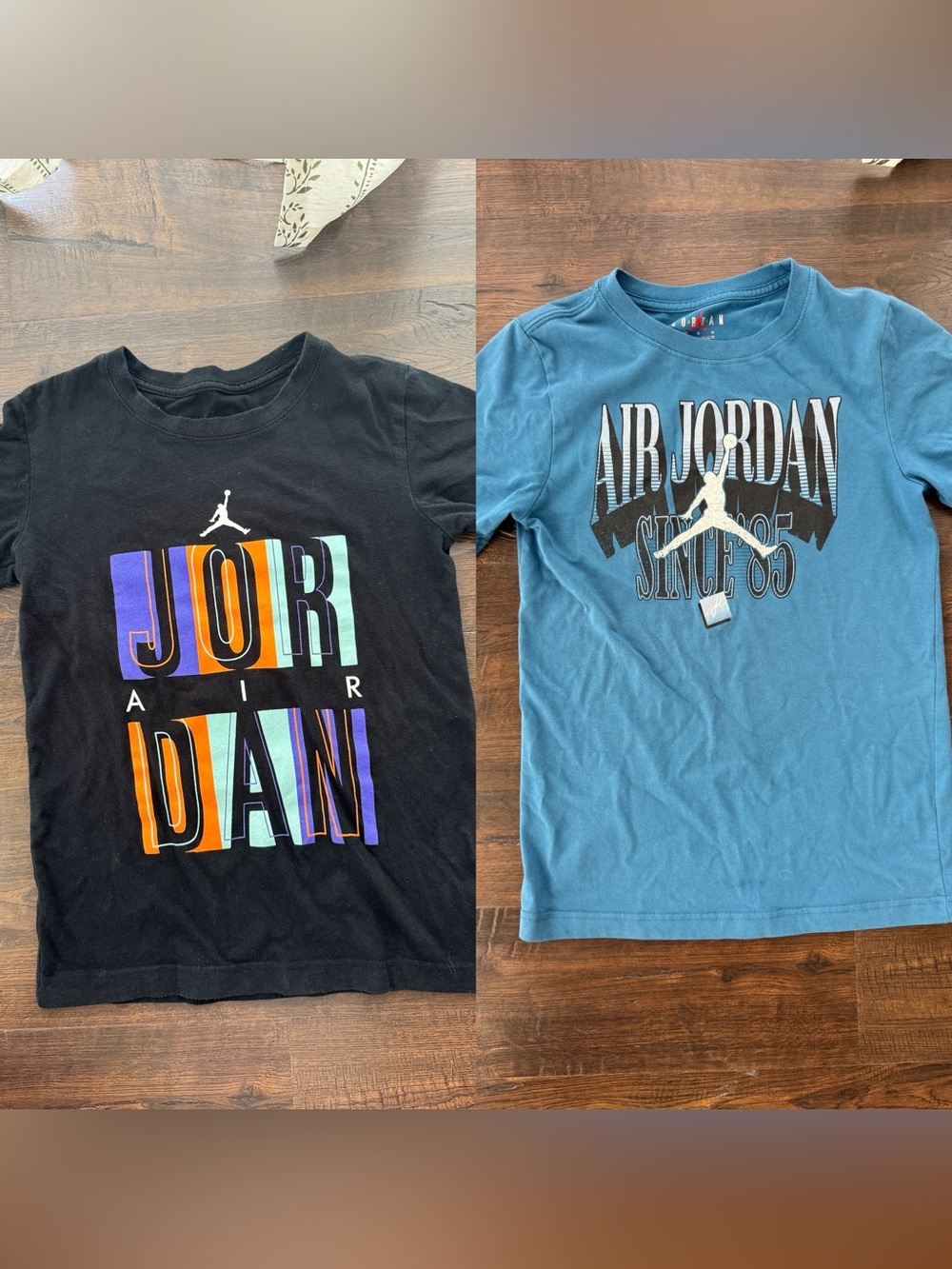 2 boys Jordan shirts